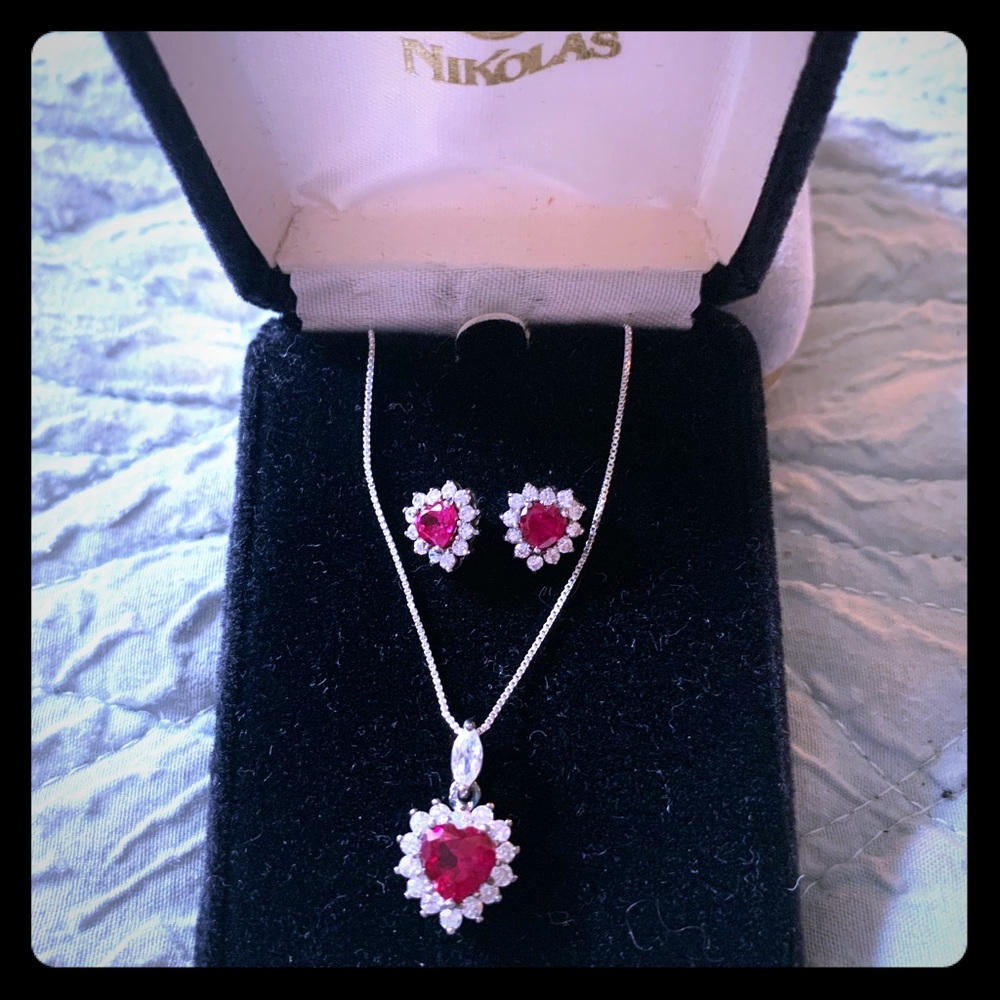 NWOT Sterling silver necklace and earring set.